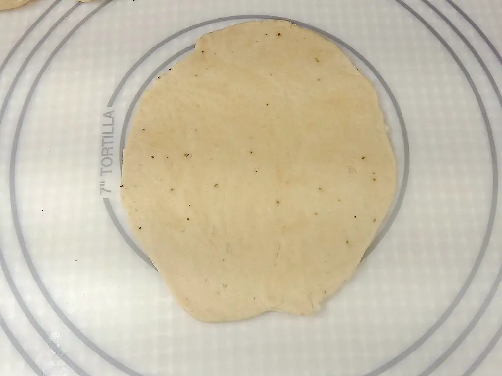 low sodium naan flatbread rolling out