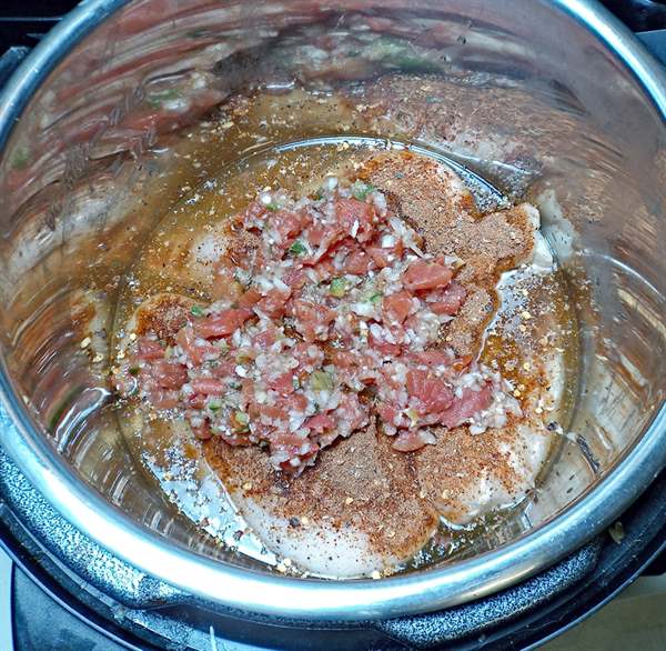 Chicken in instant pot with salsa layer