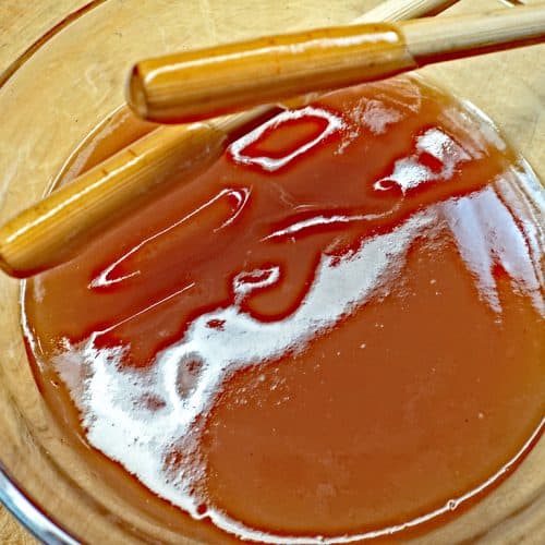 Low sodium sweet and sour sauce with chopsticks