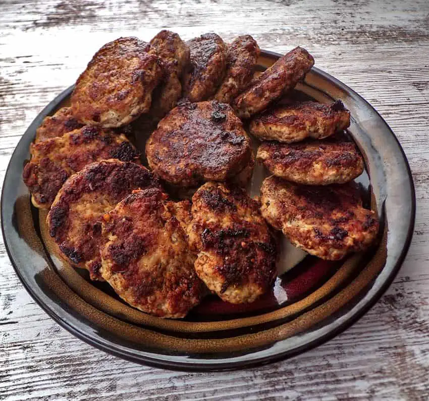 Breakfast sausage patties piled up