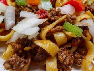 Low sodium taco spaghetti with peppers and onions