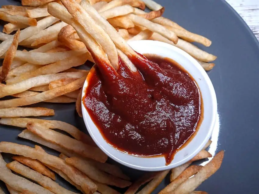 Fries dipped in delicious low sodium ketchup