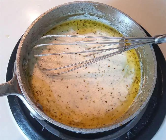 Alfredo sauce simmering