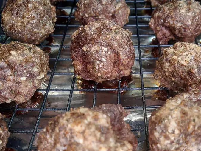 Baked meatballs on pan