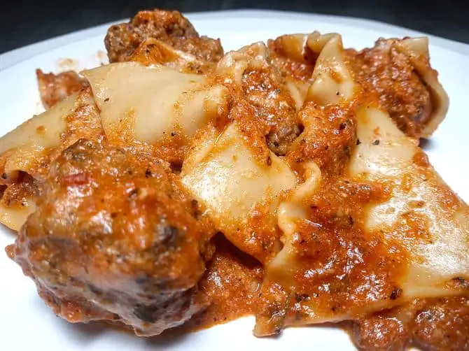 Low sodium meatball lasagna on white plate