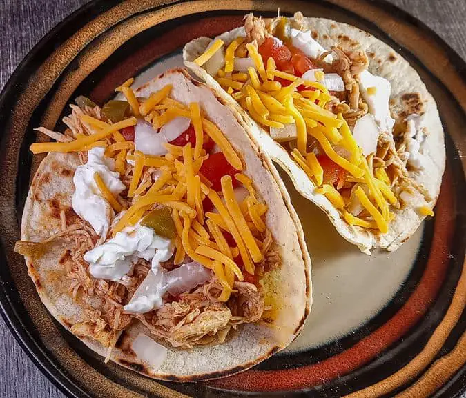 Taco shredded chicken on corn tortilla