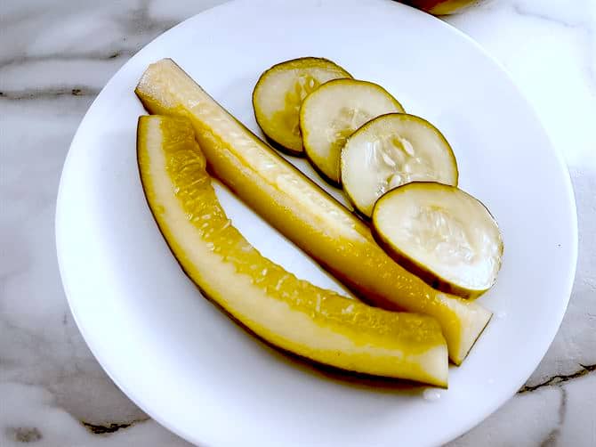 Pickles on white plate