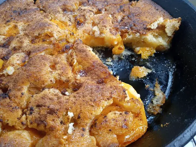 Warm low sodium peach cobbler in skillet