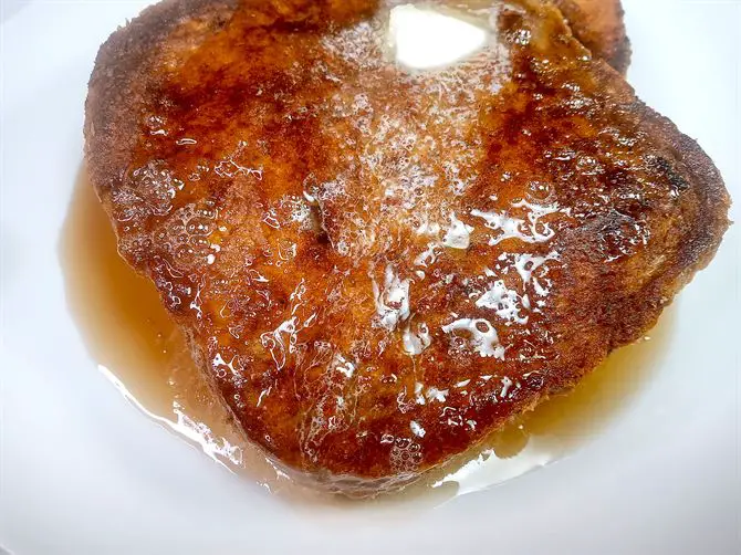 French toast with melted butter and syrup