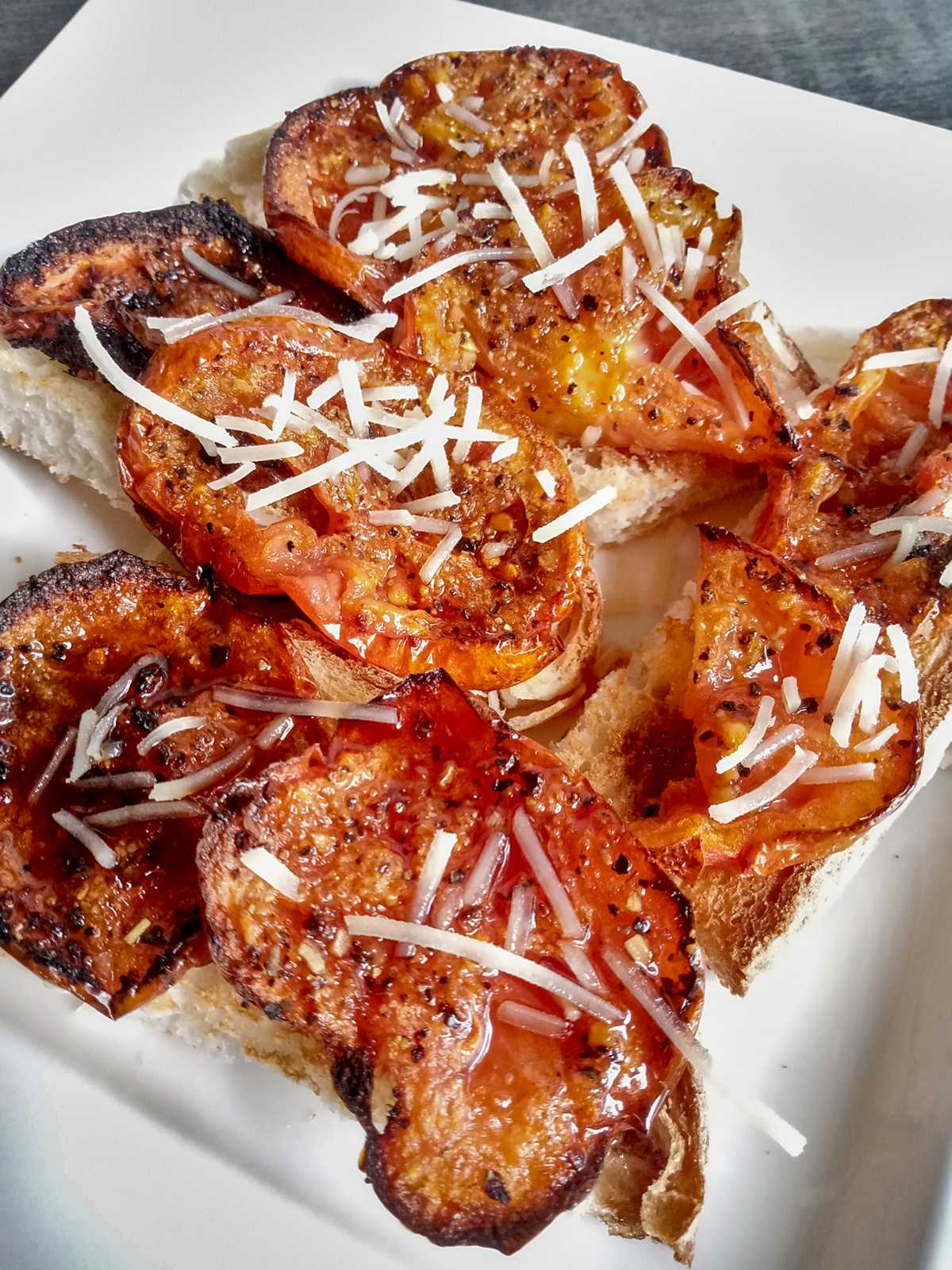 Low sodium roasted tomatoes with Parmesan sprinkle on toast points.