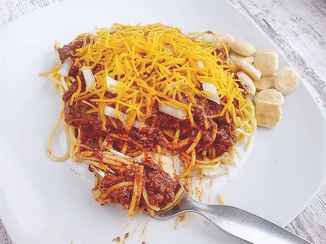Chili and spaghetti is cut not twirled