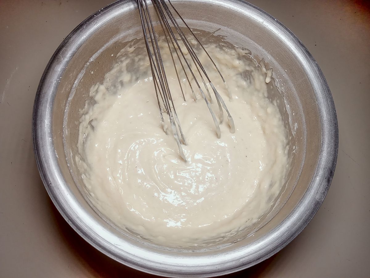 Whisked batter in bowl.