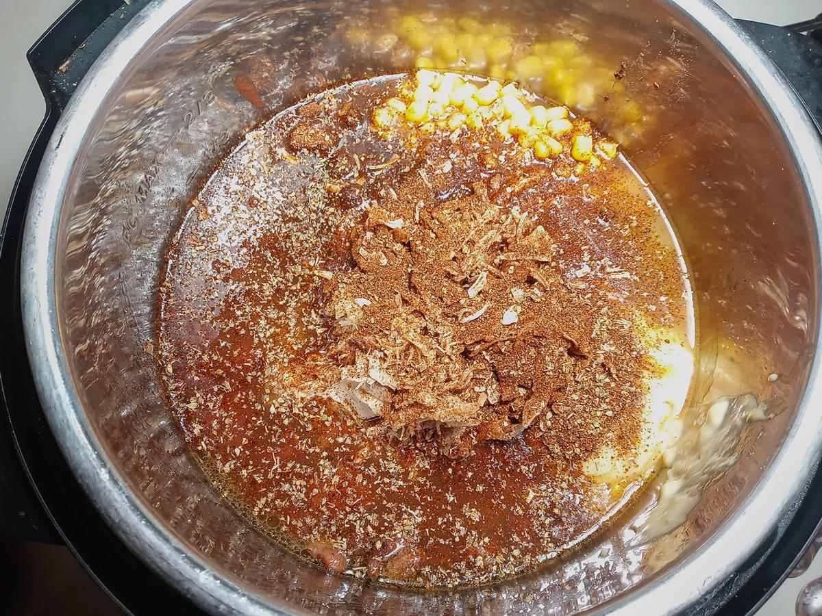 Ingredients and taco spice in instant pot