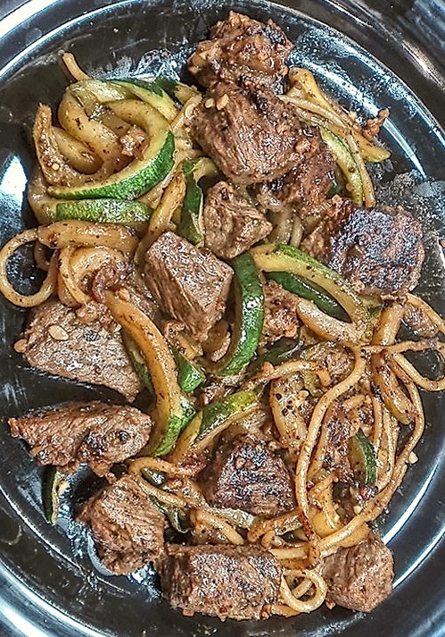 Garlic steak with zucchini spirals and noodles for a low sodium meal