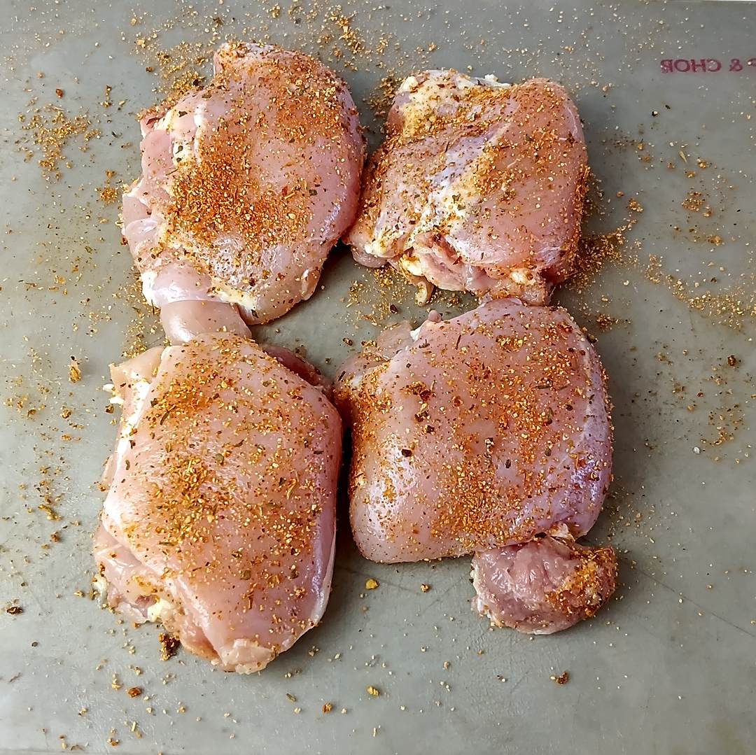 Low sodium skillet chicken thighs in sauce seasoning the chicken