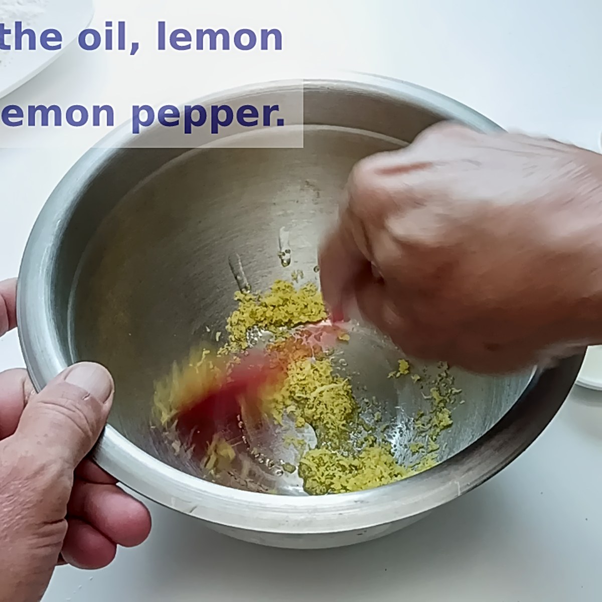 Low Sodium Lemon pepper chicken mixing the zest and oil