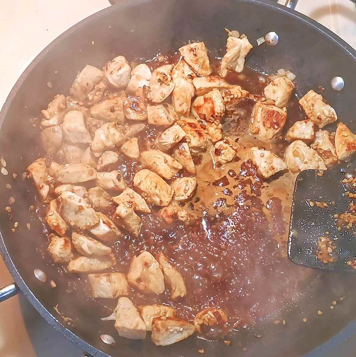 Add the broth to the chicken and deglaze the pan - process shot 4