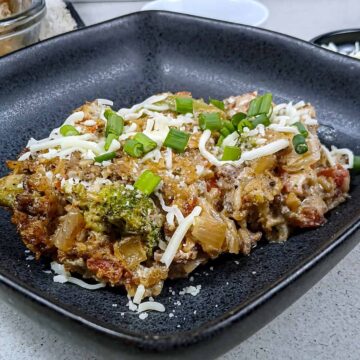 Low sodium Ground Beef & Rice Casserole in black stoneware dish featured image.