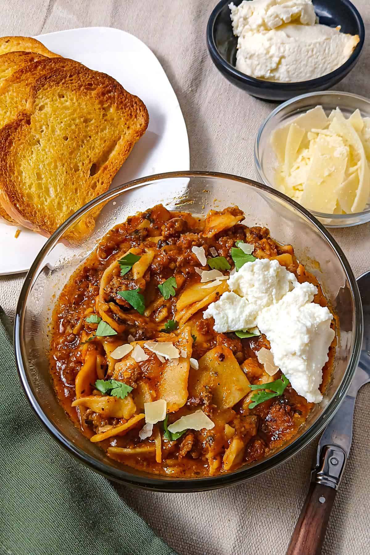 Low sodium lasagna soup with shaved parmesan, ricotta cheese and garlic bread.